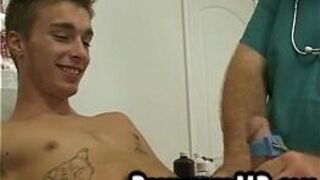 Hot stud patient is getting jerked off by his doctor - porn video